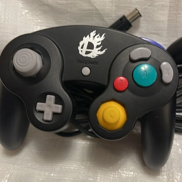 2 rereleased Nintendo GameCube controllers for Super Smash.